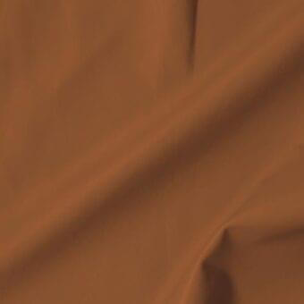 Vismara leather swatch, soft brown, diagonally draped; matte finish, dense weave, subtle tonal variations in texture.
